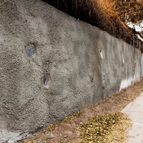 Shotcrete retaining wall with tieback anchors