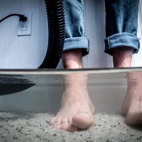 Flooded basement showing need for waterproofing